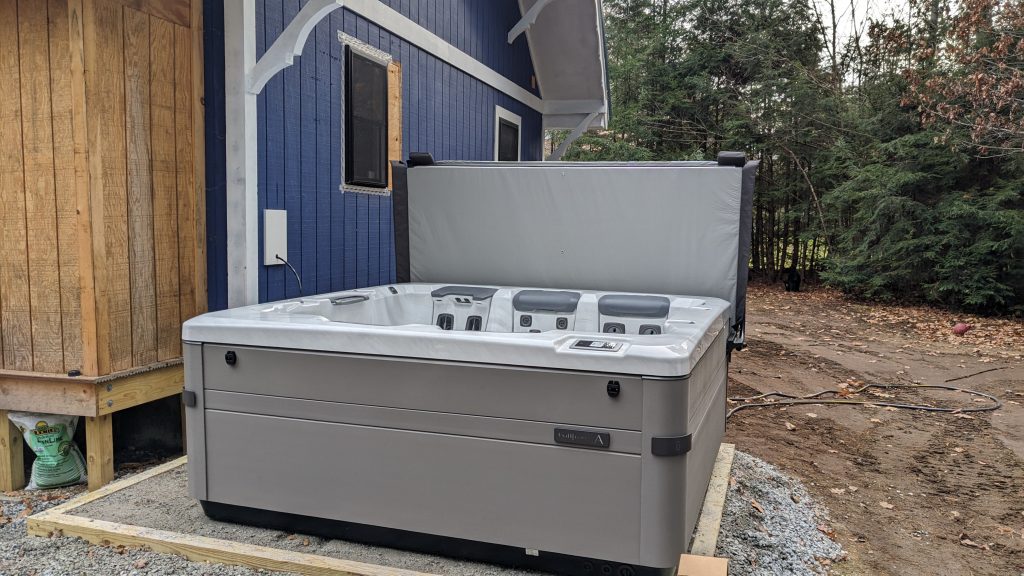 Beautiful Bullfrog Spa Addition to a Wooded Property