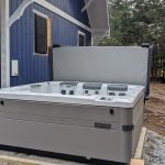 Beautiful Bullfrog Spa Addition to a Wooded Property