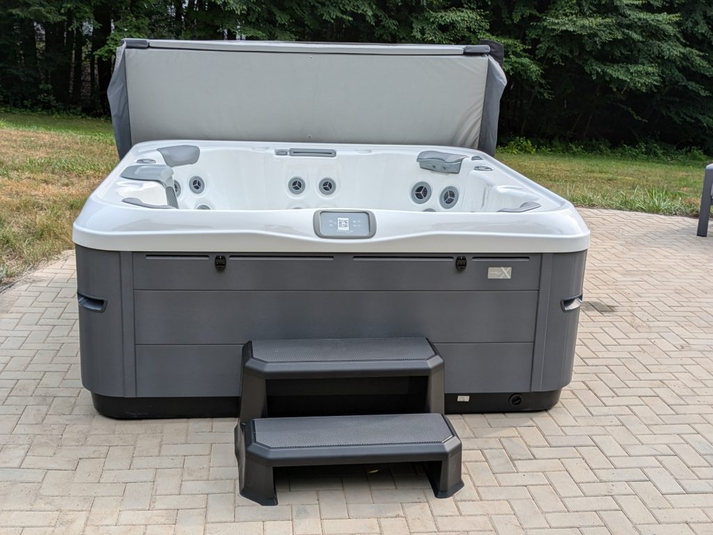 Serene Hot Tub Installation Surrounded by Nature
