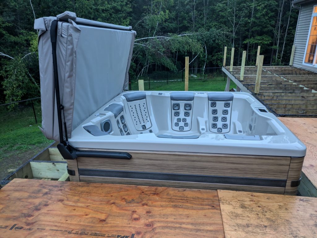 Cozy Outdoor Spa Upgrade for a Wooded Home 3