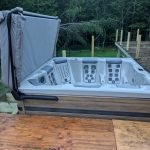 Cozy Outdoor Spa Upgrade for a Wooded Home 3