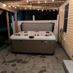 21. Woodland Hot Tub Retreat Designed for Relaxation