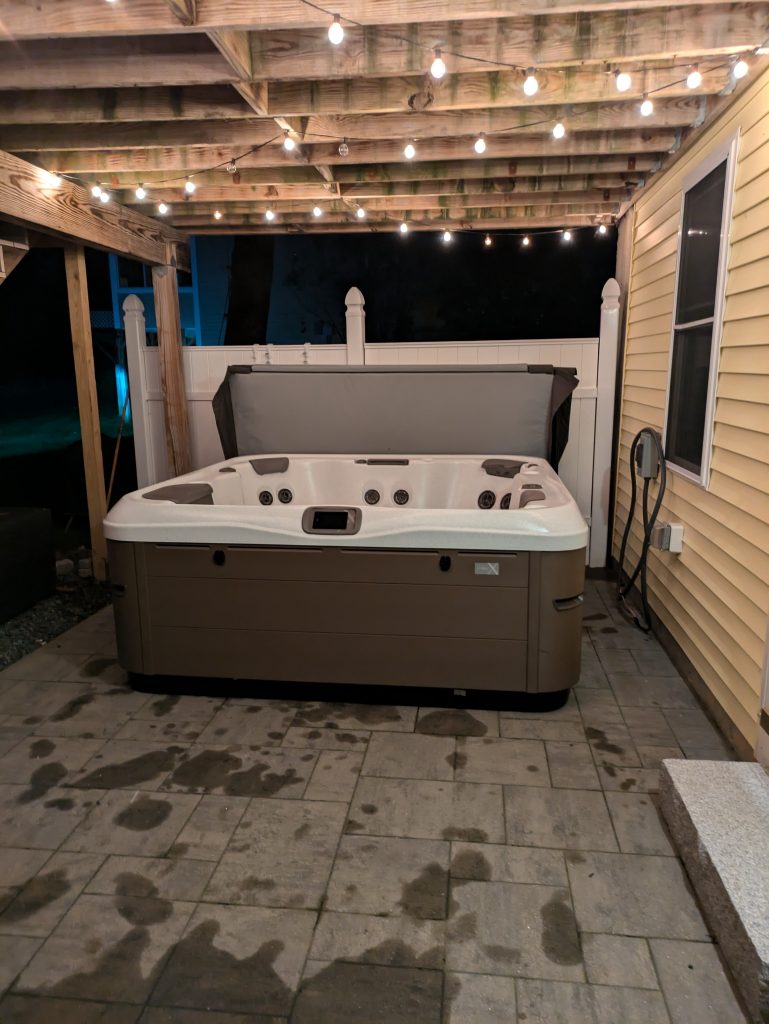 21. Woodland Hot Tub Retreat Designed for Relaxation